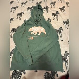 The North Face Green Hoodie with Pink Bear Design